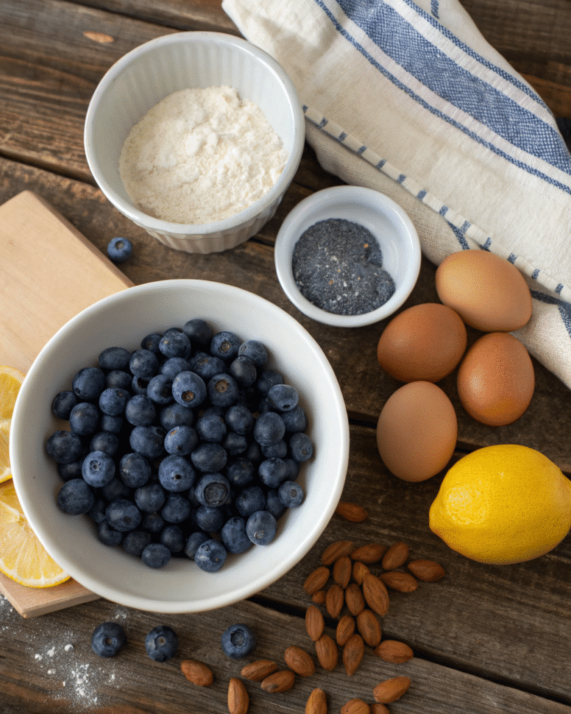 ingredients for blueberry almond clafoutis gluten free flat lay